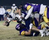 Lemoore's defense sacks Sunnyside High quarterback Tanner Wilson in the first quarter.